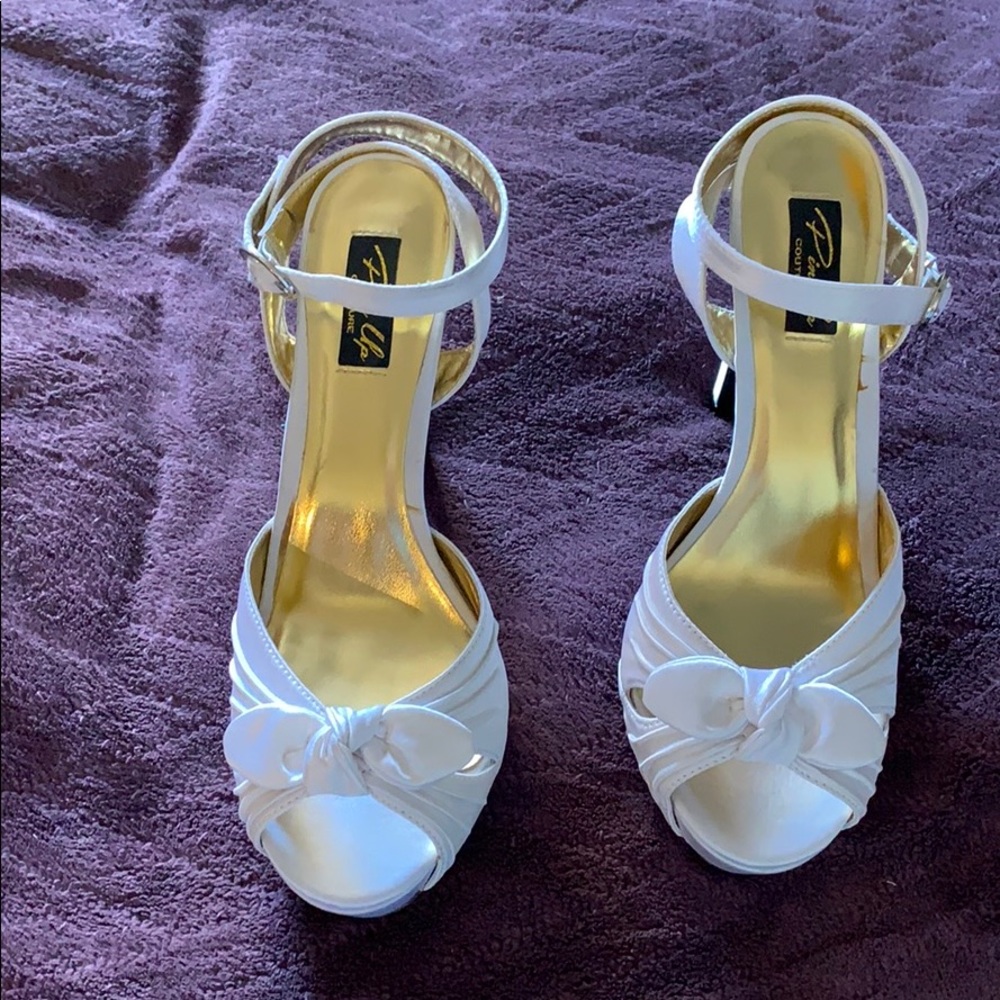 Satin white heels.